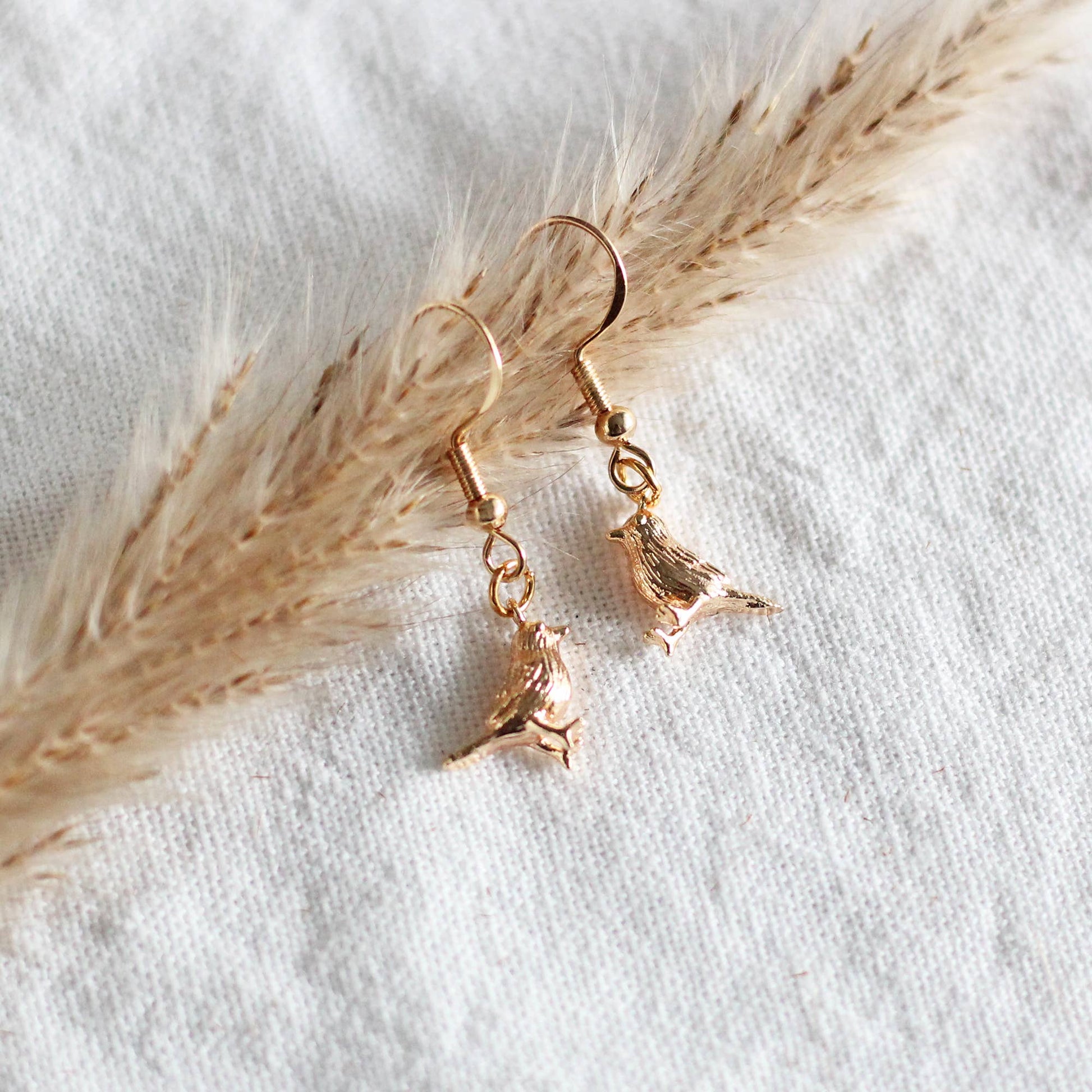 gold bird earrings